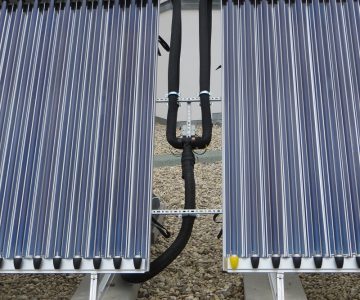 Paradigma AQUA PLASMA Solarthermie-Kollektoren auf Flachdach Roter Turm Gladbeck Handwerker Jeske GmbH