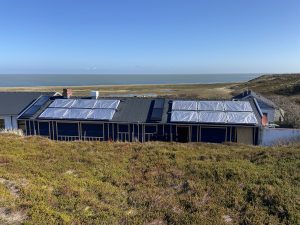 Kirche und Solarthermie Strandläufernest Sylt Paradigma